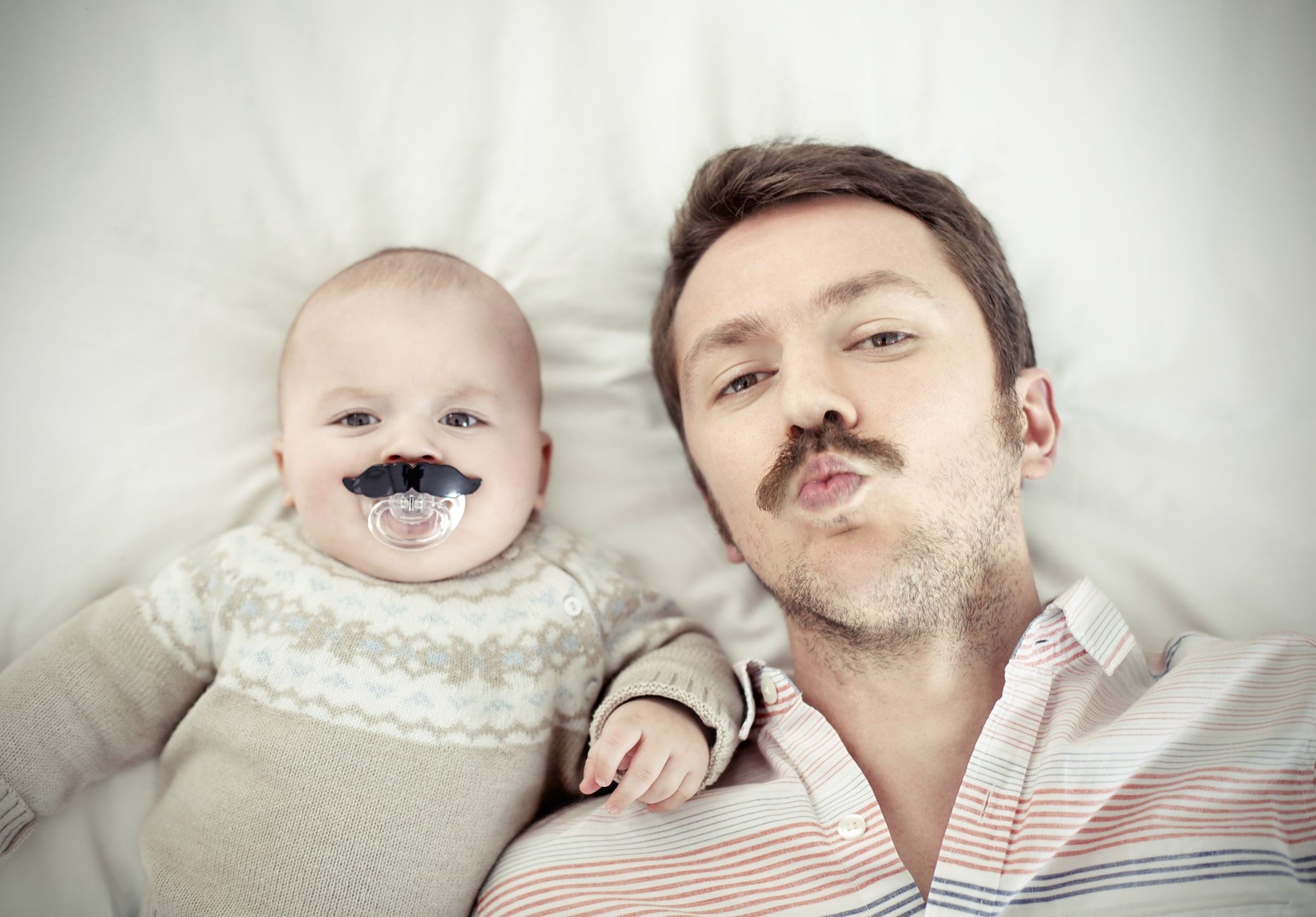 Laid back dad playing with son