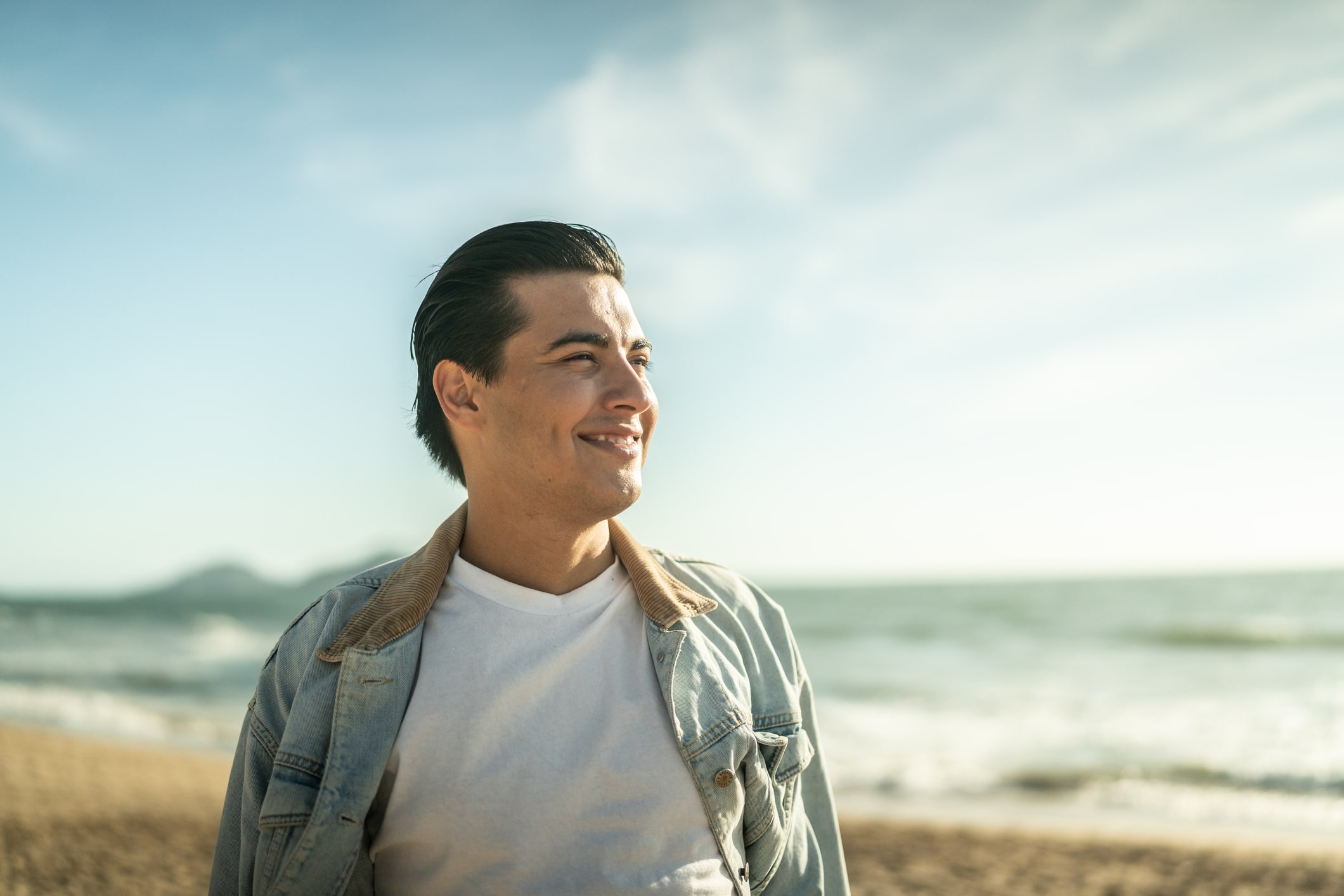 Happy man at beach.